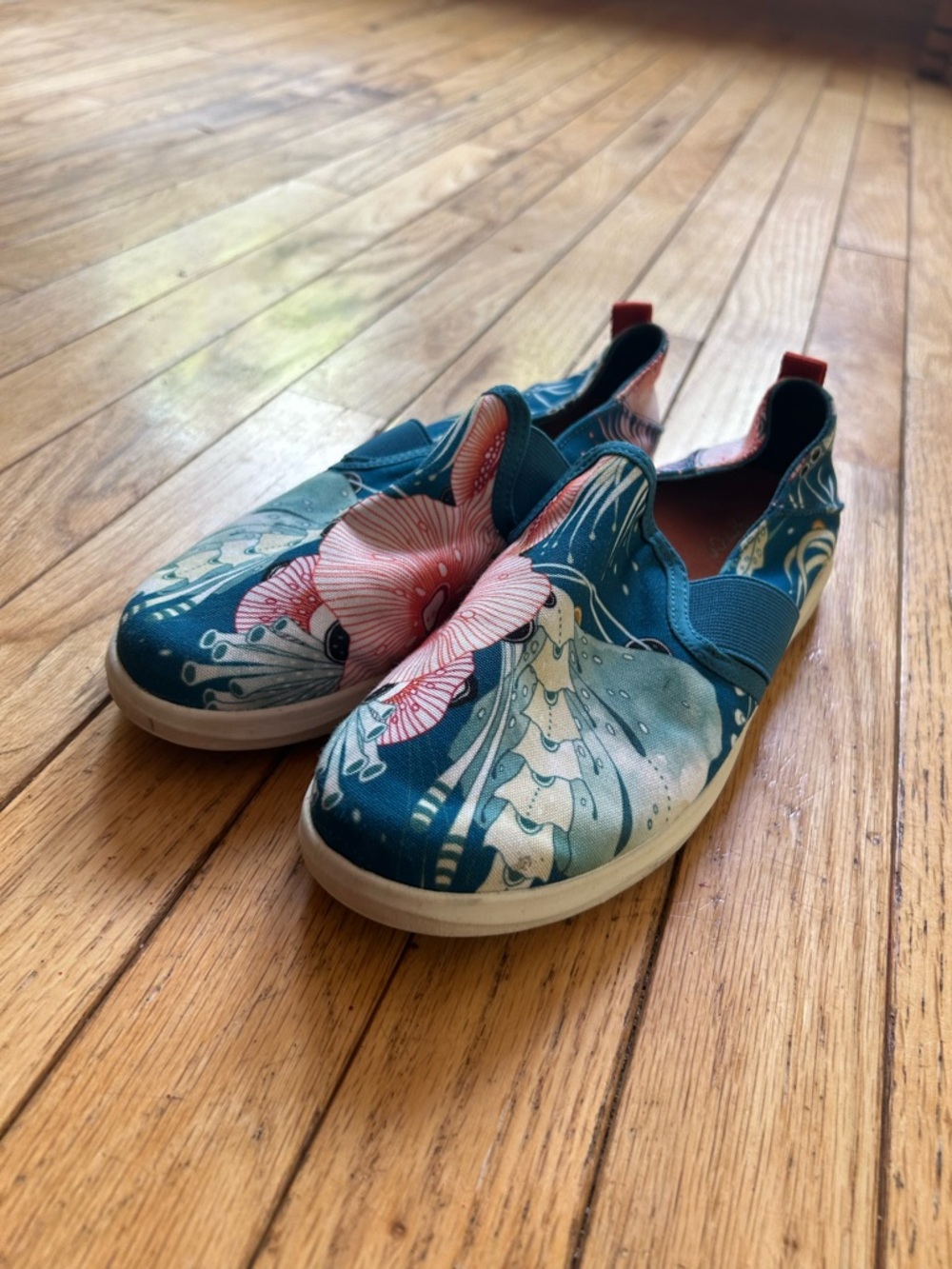 OluKai Women’s Slip-On Floral Sneakers in Teal and Pink